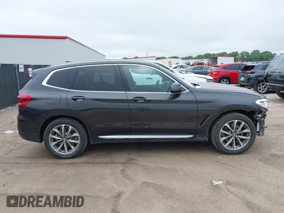 2019 BMW X3 sDrive30i z VIN 5UXTR7C58KLE96414, wystawiony jako IAAI lot #42184188 z przebiegiem 65 237 mil mil oraz . Historia ofert i sprzedaży dostępna na DreamBid. Obrazek 14.