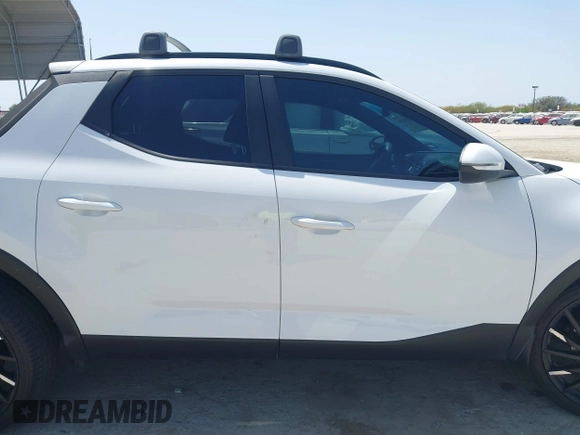 2023 Hyundai Santa Cruz SEL Premium z VIN 5NTJDDAF2PH075610, wystawiony jako IAAI lot #41855459 z przebiegiem 17 872 mil mil oraz . Historia ofert i sprzedaży dostępna na DreamBid. Obrazek 12.