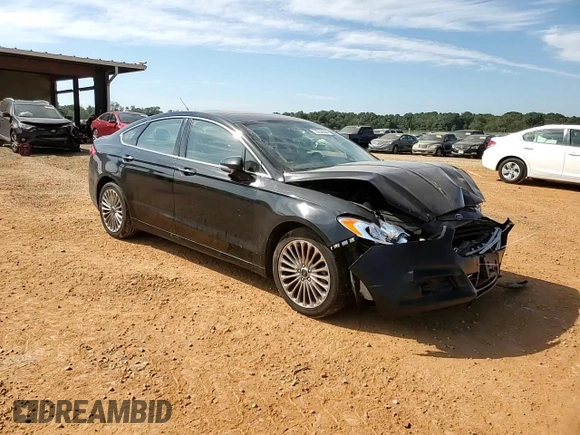 2016 Ford Fusion Titanium z VIN 3FA6P0K98GR151640, wystawiony jako Copart lot #73254594 z przebiegiem 145 473 mil mil oraz Szkoda całkowita • Salvage title. Historia ofert i sprzedaży dostępna na DreamBid. Obrazek 11.
