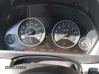 2016 BMW 3 Series 328i with VIN WBA8E9G58GNT47869, listed as a IAAI auction lot 41594120 with 57,561 mi miles. Bid and sale history available at carsss.com. Image 7.
