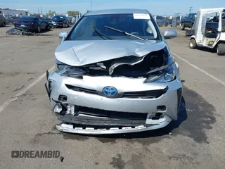 2021 Toyota Prius L Eco with VIN JTDKAMFUXM3144991, listed as a IAAI auction lot 42147025 with 106,466 mi miles and . Bid and sale history available at DreamBid. Image 11.