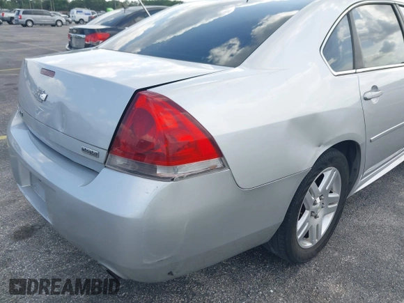 2013 Chevrolet Impala LT with VIN 2G1WG5E30D1148920, listed as a IAAI auction lot 41903310 with 134,349 mi miles and . Bid and sale history available at DreamBid. Image 6.