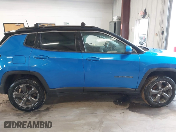 2019 Jeep Compass Latitude with VIN 3C4NJDBB8KT748817, listed as a IAAI auction lot 41289661 with 115,031 mi miles. Bid and sale history available at carsss.com. Image 13.