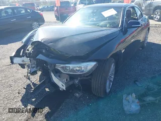 2014 BMW 4 Series 428i with VIN WBA3V7C59EJ872576, listed as a IAAI auction lot 41997699 with Not provided miles and . Bid and sale history available at DreamBid. Image 6.