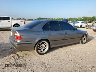 2003 BMW 5 Series 540i z VIN WBADN63473GN88833, wystawiony jako Copart lot #61287275 z przebiegiem 133 101 mil mil oraz Czysty tytuł • Clean title. Historia ofert i sprzedaży dostępna na DreamBid. Obrazek 3.