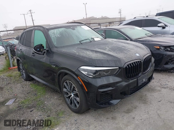 2022 BMW X5 xDrive45e with VIN 5UXTA6C09N9M81408, listed as a IAAI auction lot 41448822 with 35,147 mi miles. Bid and sale history available at carsss.com. Image 1.