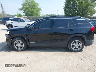 2019 GMC Terrain SLE z VIN 3GKALTEXXKL279826, wystawiony jako IAAI lot #42651208 z przebiegiem 131 740 mil mil oraz . Historia ofert i sprzedaży dostępna na DreamBid. Obrazek 14.