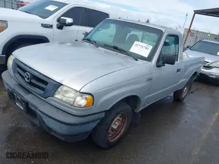 2003 Mazda B-Series 2WD Truck SX with VIN 4F4YR12D03TM16560, listed as a IAAI auction lot 41771702 with 94,027 mi miles. Bid and sale history available at carsss.com. Image 2.