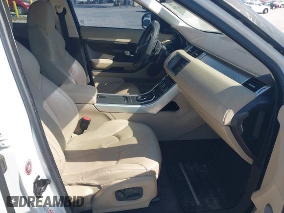 2015 Land Rover Range Rover Evoque Pure Premium z VIN SALVR2BG0FH964683, wystawiony jako IAAI lot #42016766 z przebiegiem 94 942 mil mil oraz . Historia ofert i sprzedaży dostępna na DreamBid. Obrazek 5.