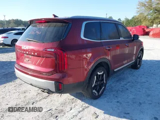 2023 Kia Telluride S with VIN 5XYP64GC4PG365452, listed as a IAAI auction lot 41772899 with 51,599 mi miles and . Bid and sale history available at DreamBid. Image 4.