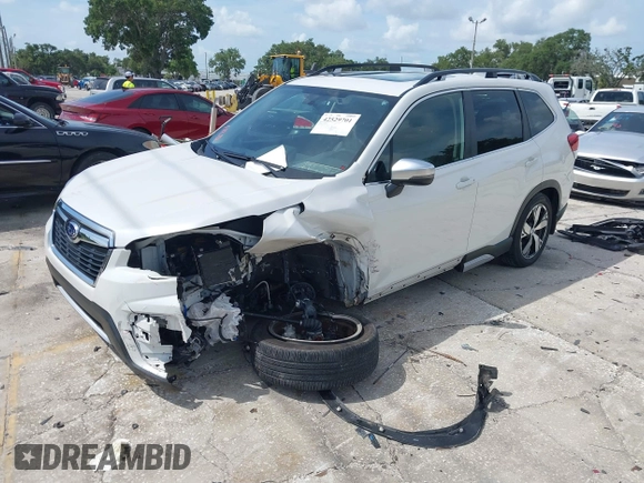 2021 Subaru Forester Touring with VIN JF2SKAXC8MH574427, listed as a IAAI auction lot 42529701 with 11,409 mi miles and . Bid and sale history available at DreamBid. Image 18.