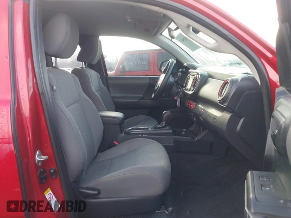 2018 Toyota Tacoma SR with VIN 5TFRX5GN5JX127708, listed as a IAAI auction lot 41654693 with 69,236 mi miles and . Bid and sale history available at DreamBid. Image 5.