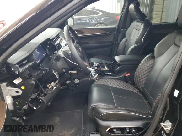 2023 Jeep Grand Cherokee Summit Reserve with VIN 1C4RJKEG3P8862582, listed as a Copart auction lot 54504345 with 9,763 mi miles and Salvage title. Bid and sale history available at DreamBid. Image 7.