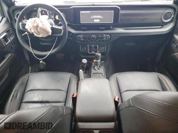 2024 Jeep Wrangler Sahara with VIN 1C4RJXP65RW210689, listed as a Copart auction lot 66482724 with 4,872 mi miles and Salvage Title. Bid and sale history available at DreamBid. Image 8.