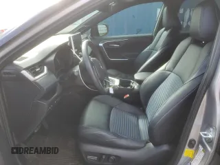 2021 Toyota RAV4 Hybrid XSE with VIN 4T3E6RFV1MU057403, listed as a Copart auction lot 47809415 with 56,570 mi miles and Salvage Title. Bid and sale history available at carsss.com. Image 7.