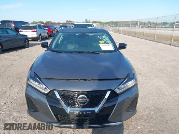 2021 Nissan Maxima SV z VIN 1N4AA6CVXMC508952, wystawiony jako IAAI lot #41900012 z przebiegiem 66 249 mil mil oraz . Historia ofert i sprzedaży dostępna na DreamBid. Obrazek 12.