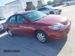 2004 Toyota Camry LE with VIN 4T1BE32KX4U272768, listed as a IAAI auction lot 42006421 with 204,386 mi miles. Bid and sale history available at carsss.com. Image 13.