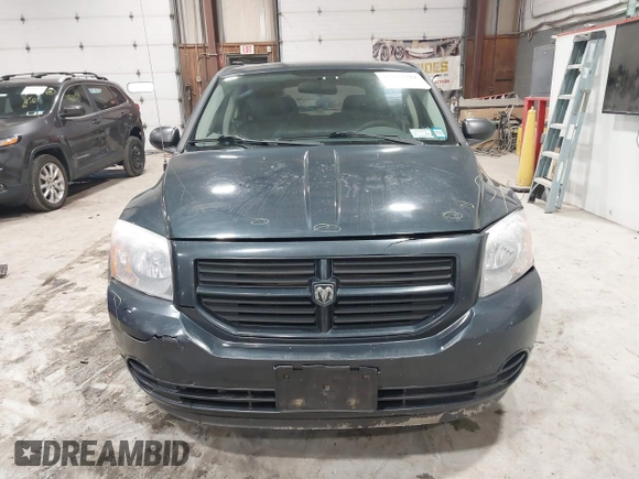 2007 Dodge Caliber with VIN 1B3HB28B27D321850, listed as a IAAI auction lot 41617311 with 180,446 mi miles. Bid and sale history available at carsss.com. Image 12.