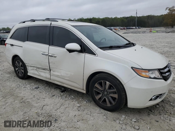 2016 Honda Odyssey Touring Elite with VIN 5FNRL5H91GB038752, listed as a Copart auction lot 50680985 with 81,576 mi miles and Salvage Title. Bid and sale history available at carsss.com. Image 4.