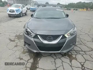 2017 Nissan Maxima SV z VIN 1N4AA6AP8HC457395, wystawiony jako Copart lot #58840075 z przebiegiem 161 551 mil mil oraz Szkoda całkowita • Salvage title. Historia ofert i sprzedaży dostępna na DreamBid. Obrazek 13.