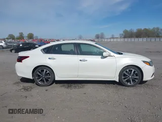 2017 Nissan Altima SV with VIN 1N4AL3AP6HC281066, listed as a IAAI auction lot 41863874 with 131,063 mi miles and . Bid and sale history available at DreamBid. Image 13.