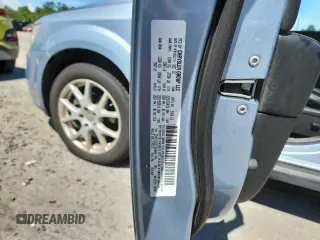 2013 Dodge Journey Crew with VIN 3C4PDCDG5DT599840, listed as a Copart auction lot 62542795 with 102,235 mi miles and Salvage title. Bid and sale history available at DreamBid. Image 13.