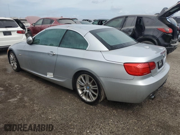 2012 BMW 3 Series 335i with VIN WBADX7C59CE744682, listed as a Copart auction lot 74878334 with Not provided miles and Salvage title. Bid and sale history available at DreamBid. Image 2.