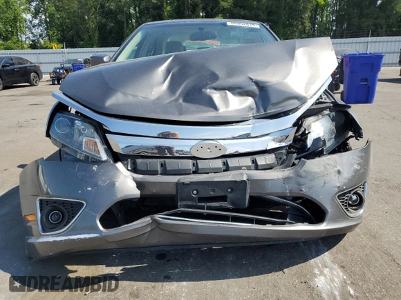 2010 Ford Fusion Hybrid z VIN 3FADP0L33AR267806, wystawiony jako Copart lot #55952815 z przebiegiem 146 912 mil mil oraz Szkoda całkowita • Salvage title. Historia ofert i sprzedaży dostępna na DreamBid. Obrazek 5.