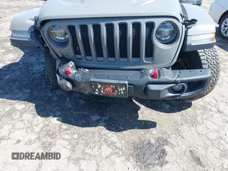 2018 Jeep Wrangler Unlimited Rubicon with VIN 1C4HJXFG6JW267087, listed as a IAAI auction lot 42235058 with 93,962 mi miles and . Bid and sale history available at DreamBid. Image 16.