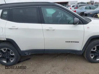 2018 Jeep Compass Trailhawk with VIN 3C4NJDDB7JT144431, listed as a IAAI auction lot 41629703 with 122,079 mi miles and . Bid and sale history available at carsss.com. Image 13.
