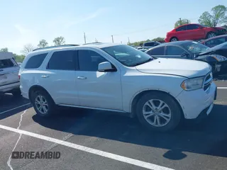 2013 Dodge Durango Crew with VIN 1C4RDJDG0DC670810, listed as a IAAI auction lot 41974024 with 209,379 mi miles and . Bid and sale history available at DreamBid. Image 13.