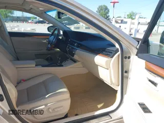 2014 Lexus ES 300h with VIN JTHBW1GG6E2045230, listed as a IAAI auction lot 42285678 with 351,398 mi miles and . Bid and sale history available at DreamBid. Image 5.