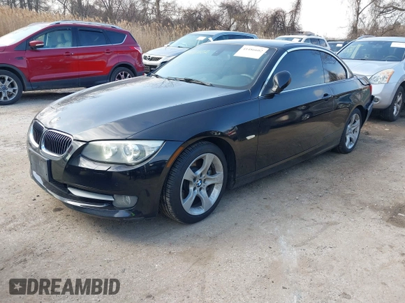 2013 BMW 3 Series 335i with VIN WBADX7C52DJ590132, listed as a IAAI auction lot 41486602 with 154,984 mi miles and . Bid and sale history available at DreamBid. Image 20.