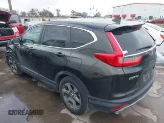 2017 Honda CR-V EX-L with VIN 7FARW1H85HE031980, listed as a IAAI auction lot 41629514 with 88,255 mi miles. Bid and sale history available at carsss.com. Image 3.