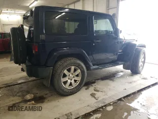 2013 Jeep Wrangler Sahara z VIN 1C4AJWBG4DL504800, wystawiony jako Copart lot #60504575 z przebiegiem 166 687 mil mil oraz Szkoda całkowita • Salvage title. Historia ofert i sprzedaży dostępna na DreamBid. Obrazek 3.
