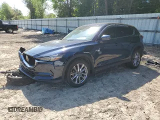 2018 Mazda CX-5 Grand Touring с VIN JM3KFADM4J1310309, выставлен на аукционе Copart как лот 51813485 с пробегом 112 513 миль миль и На запчасти • Non repairable. История ставок и продаж доступна на DreamBid. Изображение 1.