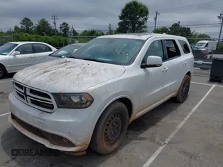 2015 Dodge Durango R/T with VIN 1C4SDJCT4FC938647, listed as a IAAI auction lot 42370175 with 179,686 mi miles and . Bid and sale history available at DreamBid. Image 2.