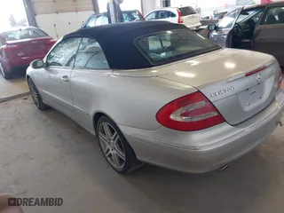 2005 Mercedes-Benz CLK-Class 3.2L with VIN WDBTK65J95F134391, listed as a IAAI auction lot 42040269 with 179,720 mi miles. Bid and sale history available at carsss.com. Image 3.