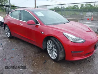 2018 Tesla Model 3 Long Range Battery with VIN 5YJ3E1EA6JF052659, listed as a IAAI auction lot 42093903 with 49,255 mi miles and . Bid and sale history available at DreamBid. Image 1.