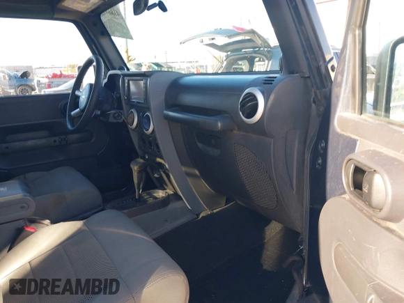 2008 Jeep Wrangler Sahara with VIN 1J4FA54108L543764, listed as a IAAI auction lot 41867734 with 186,145 mi miles and . Bid and sale history available at DreamBid. Image 5.