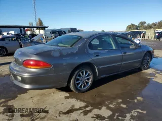 2003 Chrysler Concorde z VIN 2C3AD36M73H520219, wystawiony jako Copart lot #82895394 z przebiegiem 242 758 mil mil oraz Szkoda całkowita • Salvage title. Historia ofert i sprzedaży dostępna na DreamBid. Obrazek 3.