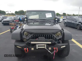 2018 Jeep Wrangler Unlimited Sport S with VIN 1C4BJWDG1JL810754, listed as a IAAI auction lot 42419199 with 74,901 mi miles and . Bid and sale history available at DreamBid. Image 12.