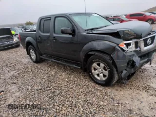 2012 Nissan Frontier Pro-4X z VIN 1N6AD0EV5CC427087, wystawiony jako Copart lot #53487845 z przebiegiem 225 076 mil mil oraz Szkoda całkowita • Salvage title. Historia ofert i sprzedaży dostępna na DreamBid. Obrazek 13.