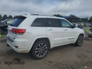 2018 Jeep Grand Cherokee High Altitude with VIN 1C4RJECG2JC442627, listed as a Copart auction lot 61041495 with 88,115 mi miles and Salvage title. Bid and sale history available at DreamBid. Image 3.