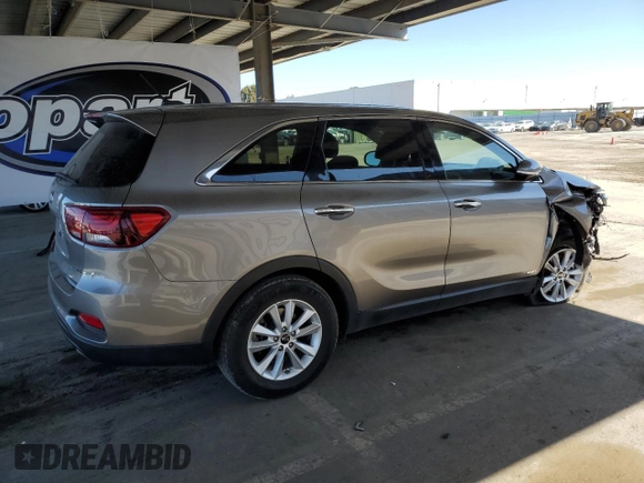 2019 Kia Sorento LX z VIN 5XYPGDA59KG463392, wystawiony jako Copart lot #54970245 z przebiegiem 99 576 mil mil oraz Szkoda całkowita • Salvage title. Historia ofert i sprzedaży dostępna na DreamBid. Obrazek 3.