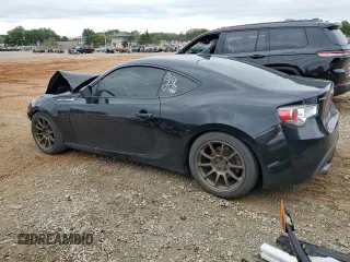 2016 Subaru BRZ Premium with VIN JF1ZCAB10G9605013, listed as a Copart auction lot 71466524 with 141,747 mi miles and Salvage Title. Bid and sale history available at DreamBid. Image 2.