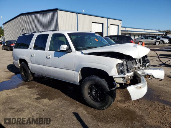 2002 GMC Yukon XL SLT with VIN 1GKEC16ZX2J121564, listed as a Copart auction lot 76110464 with 0 mi miles and Salvage Title. Bid and sale history available at carsss.com. Image 4.