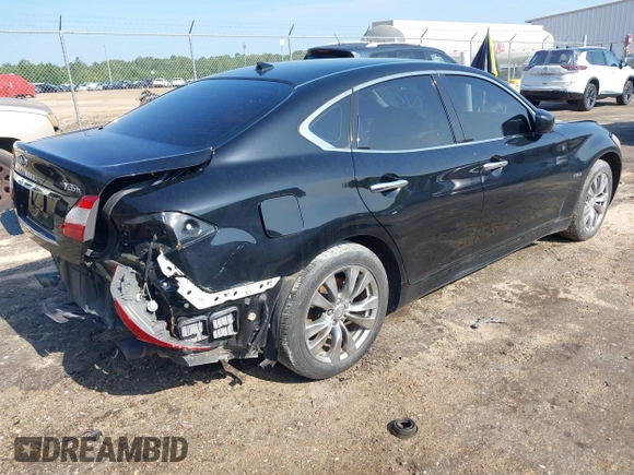 2012 Infiniti M Hybrid with VIN JN1EY1AP8CM910933, listed as a IAAI auction lot 42682477 with 157,048 mi miles and . Bid and sale history available at DreamBid. Image 4.