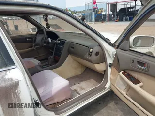 1991 Lexus LS z VIN JT8UF11E6M0075970, wystawiony jako IAAI lot #41872951 z przebiegiem 217 251 mil mil oraz . Historia ofert i sprzedaży dostępna na DreamBid. Obrazek 5.