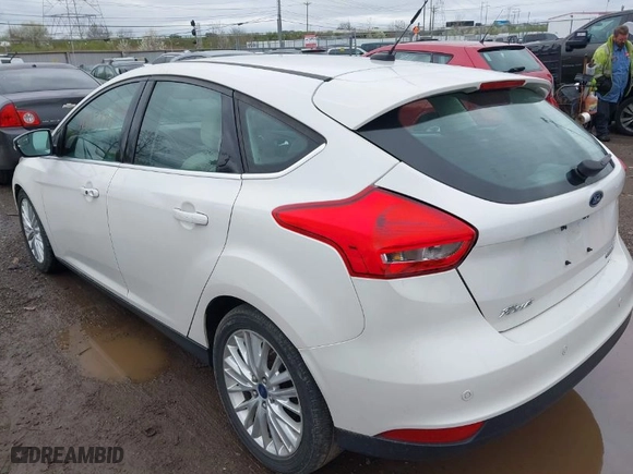 2015 Ford Focus Titanium with VIN 1FADP3N23FL293432, listed as a IAAI auction lot 41929774 with 100,865 mi miles. Bid and sale history available at carsss.com. Image 3.